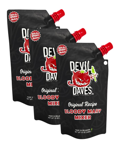 Three black pouches of Devil Dave's Bloody Mary mixer with red and white text on a white background.