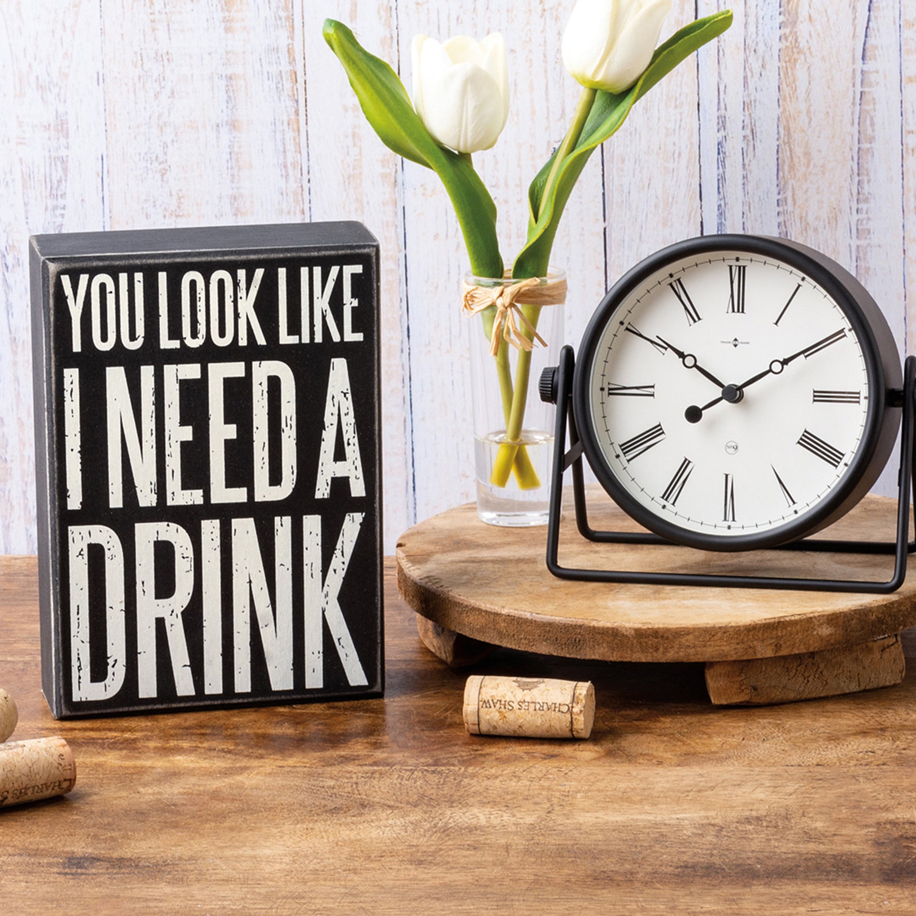 you look like I need a drink sign
